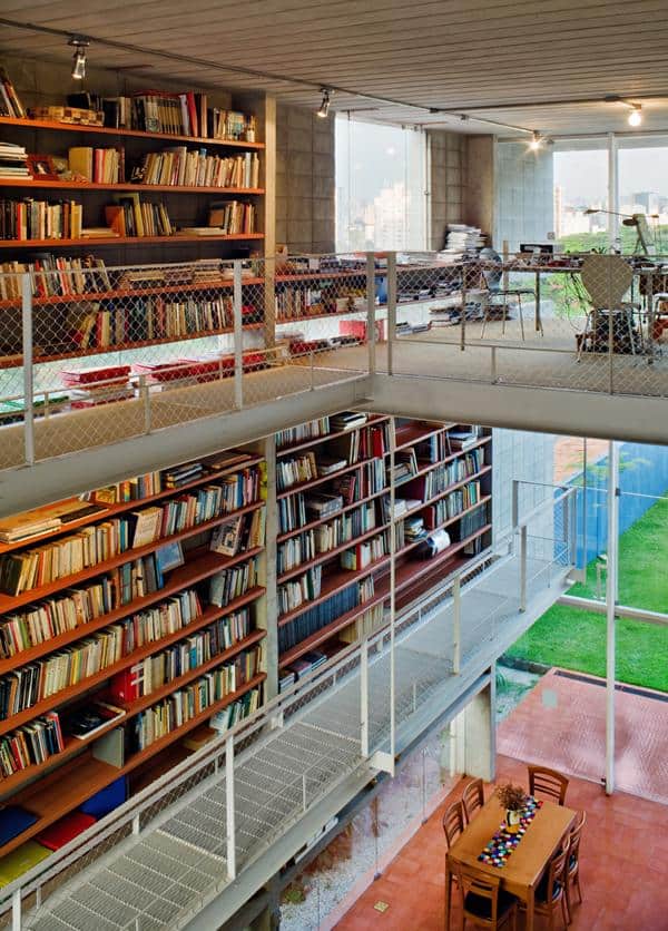 3 storey wall books creates privacy contemporary home  1 library